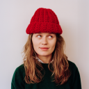 Discovery icon for girl in red Discord server